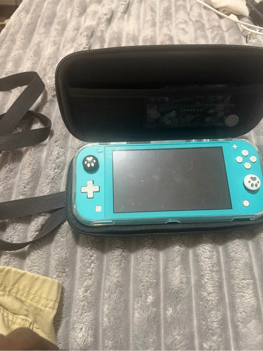 Nintendo Switch Lite Turquoise Handheld Console with Screen On